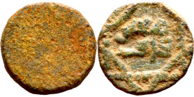 Umayyad/Abbasid. Bronze coin. Obverse: Arabic inscription. Reverse: Arabic inscription

10mm 1.31g