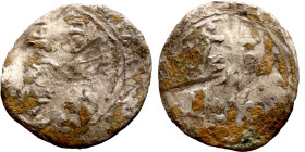 Umayyad/Abbasid. Silver coin. Obverse: Arbic inscription. Reverse: Arabic inscription

13mm 0.77g