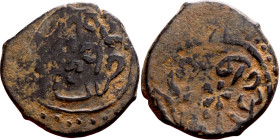 Seljuk (1037–1157) bronze coin. Obverse: Arabic inscription. Reverse: Arabic inscription

18mm 2.89g