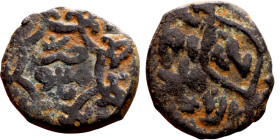 Seljuk (1037–1157) bronze coin. Obverse: Arabic inscription. Reverse: Arabic inscription

18mm 2.72g