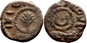 Umayyad/Abbasid. Bronze coin. Obverse: Arbic inscription. Reverse: Arabic inscription

14mm 2.83g