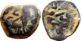 Seljuk (1037–1157) bronze coin. Obverse: Arabic inscription. Reverse: Arabic inscription

20mm 4.05g