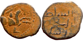 Seljuk (1037–1157) bronze coin. Obverse: Arabic inscription. Reverse: Arabic inscription

18mm 2.67g