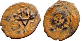 Seljuk (1037–1157) bronze coin. Obverse: Arabic inscription. Reverse: Arabic inscription

19mm 1.59g