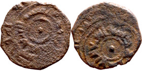 Seljuk (1037–1157) bronze coin. Obverse: Arabic inscription. Reverse: Arabic inscription

14mm 0.97g
