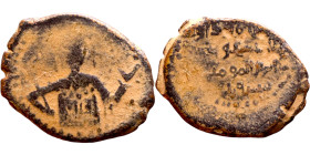 Seljuk (1037–1157) bronze coin. Obverse: Arabic inscription. Reverse: Arabic inscription

17mm 3.12g

Artificial sand patina