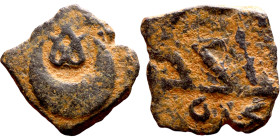 Seljuk (1037–1157) bronze coin. Obverse: Arabic inscription. Reverse: Arabic inscription

17mm 2.90g