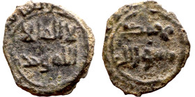Umayyad/Abbasid. Bronze coin. Obverse: Arbic inscription. Reverse: Arabic inscription

19mm 1.85g