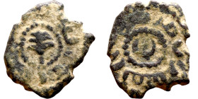 Umayyad/Abbasid. Bronze coin. Obverse: Arbic inscription. Reverse: Arabic inscription

15mm 2.91g