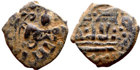 Umayyad/Abbasid. Bronze coin. Obverse: Arbic inscription. Reverse: Arabic inscription

16mm 2.03g