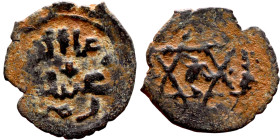 Seljuk (1037–1157) Bronze coin. Obverse: Arabic inscription. Reverse: Arabic inscription

16mm 0.79g