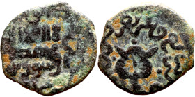 Seljuk (1037–1157) Bronze coin. Obverse: Arabic inscription. Reverse: Arabic inscription

14mm 1.42g