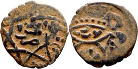 Seljuk (1037–1157) Bronze coin. Obverse: Arabic inscription. Reverse: Arabic inscription

17mm 2.06g