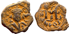 Constans II (641-668) Follis. Obverse: Imperial figure holding cross and globus Reverse: m and inscription

26mm 6.80g

Artificial sand patina