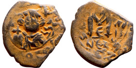 Constans II (641-668) Follis. Obverse: Imperial figure holding cross and globus Reverse: m and inscription

27mm 5.96g

Artificial sand patina