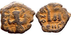 Constans II (641-668) Follis. Obverse: Imperial figure holding cross and globus Reverse: m and inscription

22mm 3.90g

Artificial sand patina
