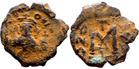 Constans II (641-668) Follis. Obverse: Imperial figure holding cross and globus Reverse: m and inscription

20mm 2.12g

Artificial sand patina