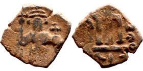 Constans II (641-668) Follis. Obverse: Imperial figure holding cross and globus Reverse: m and inscription

22mm 4.43g