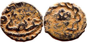 Seljuk (1037–1157) Bronze coins. Obverse: Arabic inscription. Reverse: Arabic inscription

11mm 1.00g