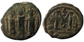 Umayyad Caliphate. temp. Mu'awiya I ibn Abi Sufyan (AH 41-60 / AD 661-680). Arab-Byzantine type
AE Fals (19mm, 4,06g)