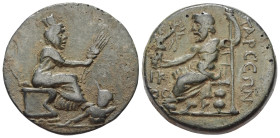 Kilikien. Tarsos. Pseudo-autonome Prägung.

 Bronze. 1. Jhdt. n. Chr.
Vs: Tyche mit Ähren nach rechts sitzend, zu ihren Füßen Flussgott nach rechts...