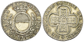 Schweiz. Solothurn.

 5 Batzen (Silber). 1826.
Vs: Bekröntes Wappen zwischen Zweigen über Wertangabe.
Rs: Kreuz mit C in der Mitte.

26 mm. 4,41...