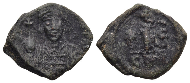 Justinian I (AD 527-565). Constantinople
AE Decanummium (18,7mm 2,1g)
Obv: Hel...