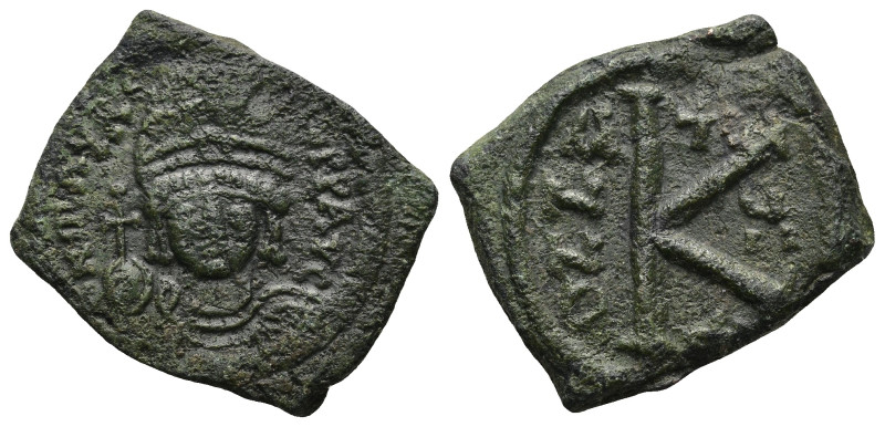 Maurice Tiberius (582-602 AD). Constantinople.
AE Half Follis (23,3mm 4,7g)
Ob...