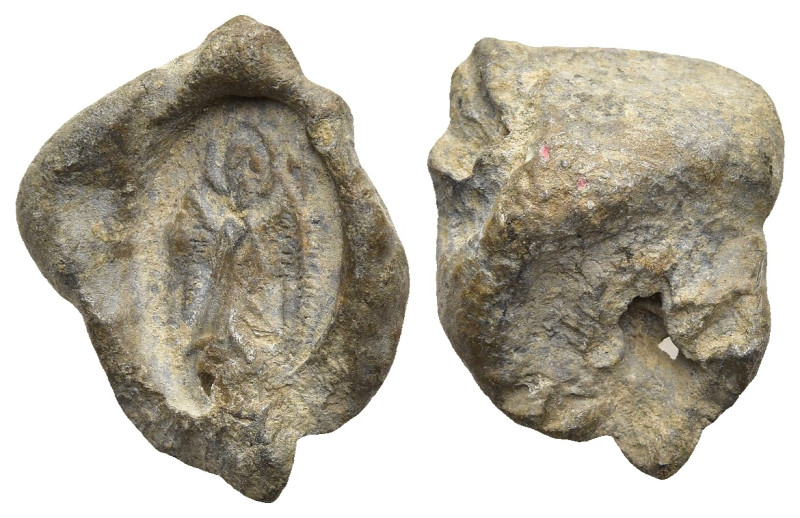 Roman Lead Seal
(6,9g 12,8mm diameter)
Obv: Victory standing facing
