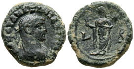 MAXIMIANO. Tetradracma. (Ae. 7,18g/20mm). Año 2 (286-287 d.C.). Alejandría. (Emmett 4114). Anv: Busto laureado de Claudio II a derecha, alrededor leye...