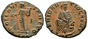 MAXIMINO II. Follis. (Ae. 1,72g/15mm). 310-311 d.C. Antioquía. (Van Heesch, Last 3a; Vagi 2954). Anv: Tyche de frente y sentada sobre roca, enturbada ...