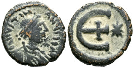 JUSTINIANO I. Pentanummium. (Ae. 2,45g/17mm). 537-551 d.C. Antioquía. (Seaby 241). Anv: Busto diademado y drapeado de Justiniano I a derecha, alrededo...