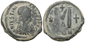 Byzantine
Justinian I. 527-565. Æ Follis . Constantinople, 527-538. D N IVSTINIANVS PP AVG, diademed and draped bust right / Large M, cross above, st...