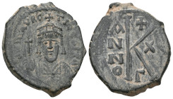 Byzantine
Maurice Tiberius, 582-602. Half follis AE, Constantinople. Crowned and cuirassed bust facing, holding globus cruciger and shield decorated ...