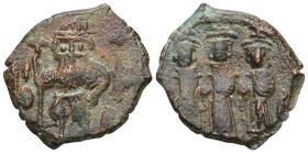 Byzantine
. Constans II, Constantine IV, Heraclius, and Tiberius, AE, Follis, (Bronze.) Constantinople. 641-668 AD.
Obv: Constans bust facing with l...
