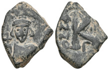 Byzantine Coins , Bronze AE.

Weight:4 gr
Diameter:22 mm