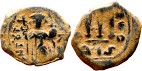 Constans II (641-668) Follis. Obverse: Imperial figure holding cross and globus Reverse: m and inscription

 22mm 4.49g