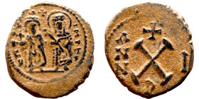 Phocas .(602-610). Decanummium. Obverse: Bust of Phocas and Leonita Reverse: Large X, cross above

 15mm 2.73g