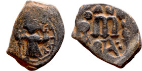 Constans II (641-668) Follis. Obverse: Imperial figure holding globus Reverse: m and inscription

 23mm 6.38g