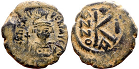 Heraclius (610-641) Half Follis. Obverse: Helmeted and cuirassed bust facing, holding globus cruciger and shield., Reverse: Large K above cross, ANNO...