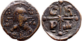 Romanus IV Diogenes (1068-1071) Follis Obverse: IC-XC over NI-KA to left and right of bust of Christ facing, dotted cross behind head, holding book of...