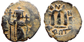 Constans II (641-668) Follis. Obverse: Imperial figure holding globus Reverse: m and inscription

 22mm 4.58g