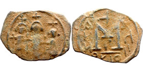 Heraclius, Martina and Heraclius Constantine (610-641) Follis Obverse: From left, Martina, Heraclius, heraclius Constantine Reverse: Large M, ANNO,
...