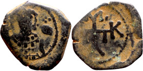 Manuel I. AE Half-TetarteronThessalonica mint. Obv: Monogram Sear 57 (Δ-M-K-ΠΛ clockwise from left at the ends of a cross) in small, neat letters Rev:...