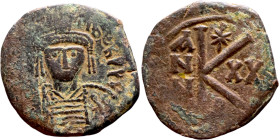 Maurice Tiberius (582-602) Half Follis. Obverse: Helmeted and cuirassed bust facing, holding globus cruciger and shield., Reverse: Large K above cross...