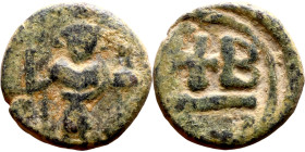 Constans II (641-602) 12 Nummi, Alexandria. Obv: Crowned bust facing, unbearded, wearing chlamys, holding long cross, sometimes topped by chi-rho, and...