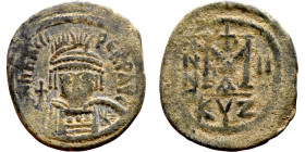 Heraclius (610-641) Follis. Obverse: Helmeted and cuirassed bust facing, holding globus cruciger and shield., Reverse: Large M above cross, ANNO

 2...