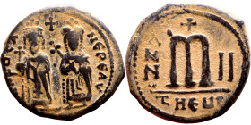 Phocas and Leontia.(602-610). Follis. . Obverse: Standing Phocas and Leonita Reverse: Large m between ANNO and regnal year.

 27mm 11.13g