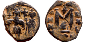 Heraclius and Hercalius. Constantine (610-641) Follis. Obverse: Heraclius on left, Heraclius Constaninte on right, . Reverse: ANNO, Large M, cross abo...