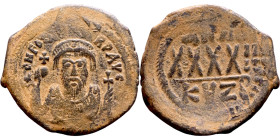 Phocas (602-610) Follis. Obverse: DN FOCA PERP AVG Crowned bust facing, wearing consular robes, holding mappa and eagle-tipped scepter , Reverse: Larg...